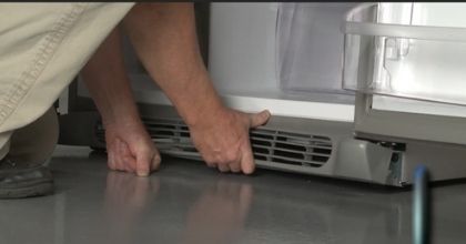 Detaching the lower refrigerator grill