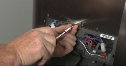 use screwdriver to open the panel